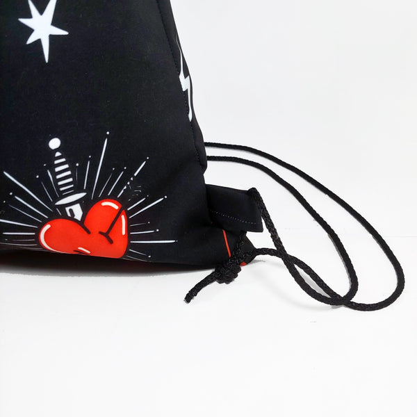 Mochila saco corazón sagrado