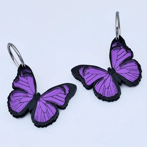 Pendientes mariposa morados