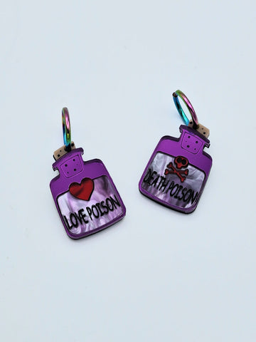 Pendientes pócima morados