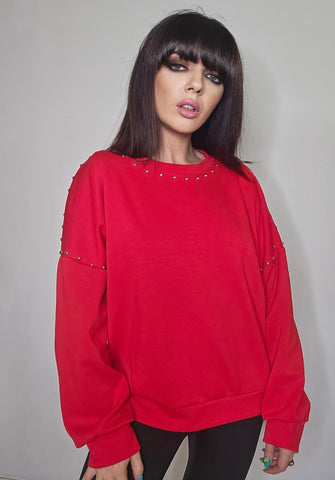 Sudadera roja tachuelas