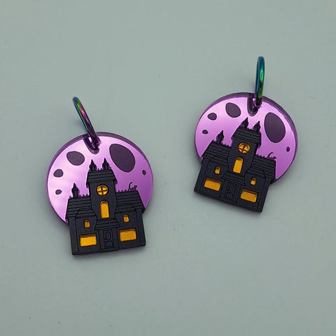 Pendientes casa encantada morados